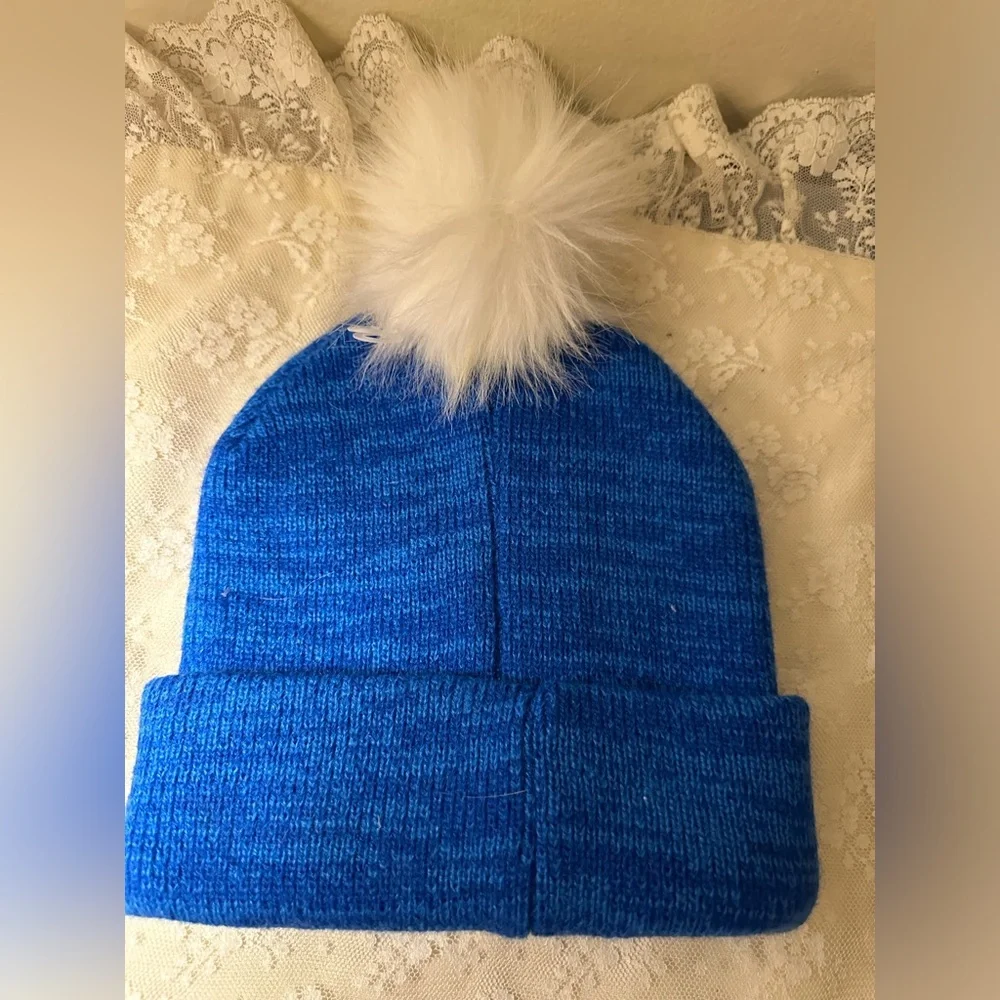 Disney Frozen Blue Beanie with White Pom Pom - Natalie written on it